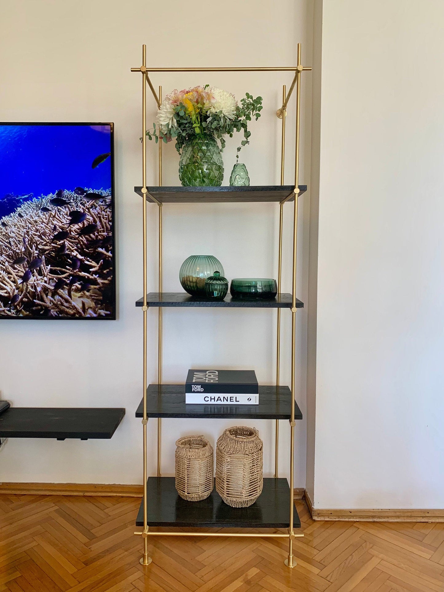 Gold bookcase and gold shelving unit. Harmony of unlacquered brass and dark oiled oak. Reflect luxury in your decoration. Shelving Brassshelf