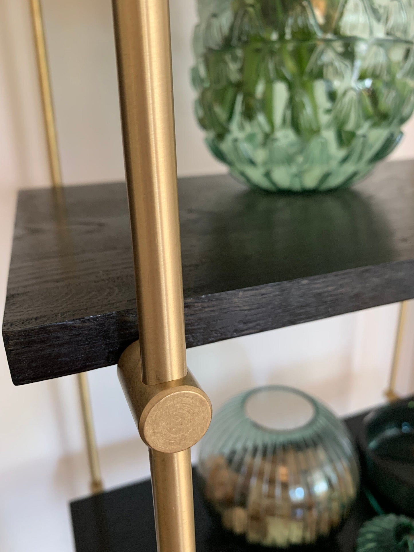 Gold bookcase and gold shelving unit. Harmony of unlacquered brass and dark oiled oak. Reflect luxury in your decoration. Shelving Brassshelf