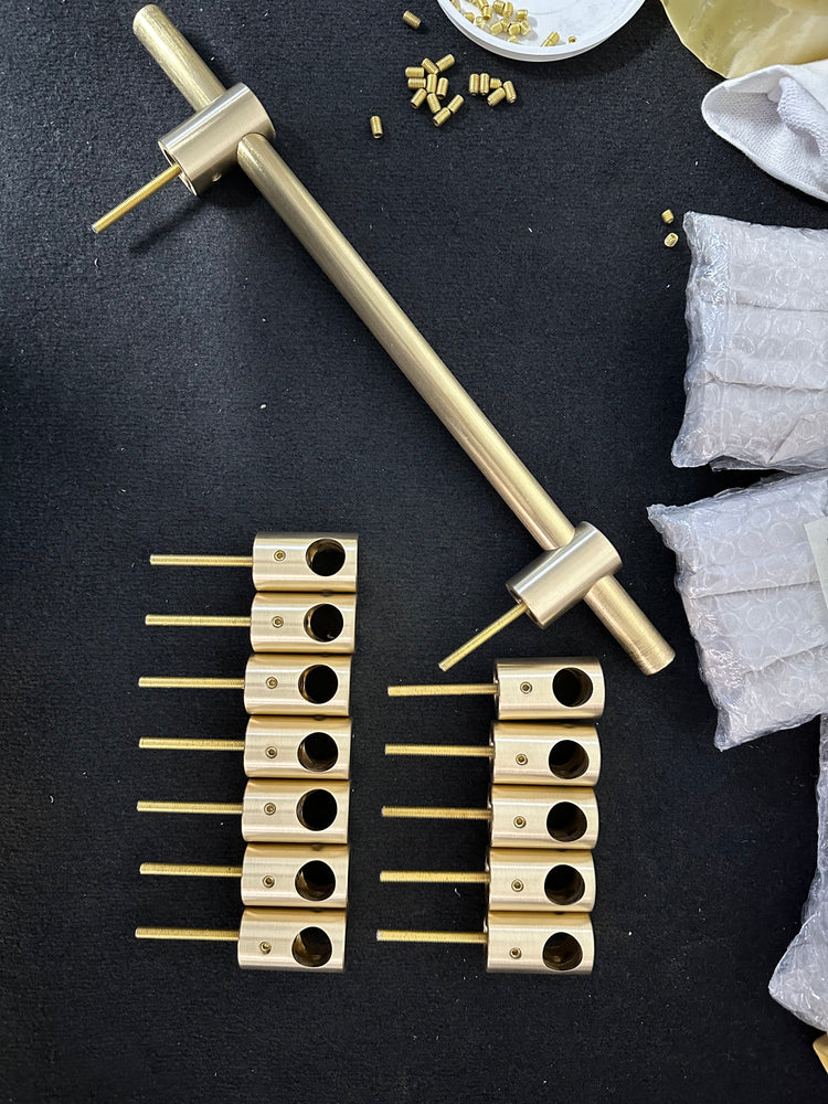 Custom solid brass drawer pull hardware detail, brushed finish