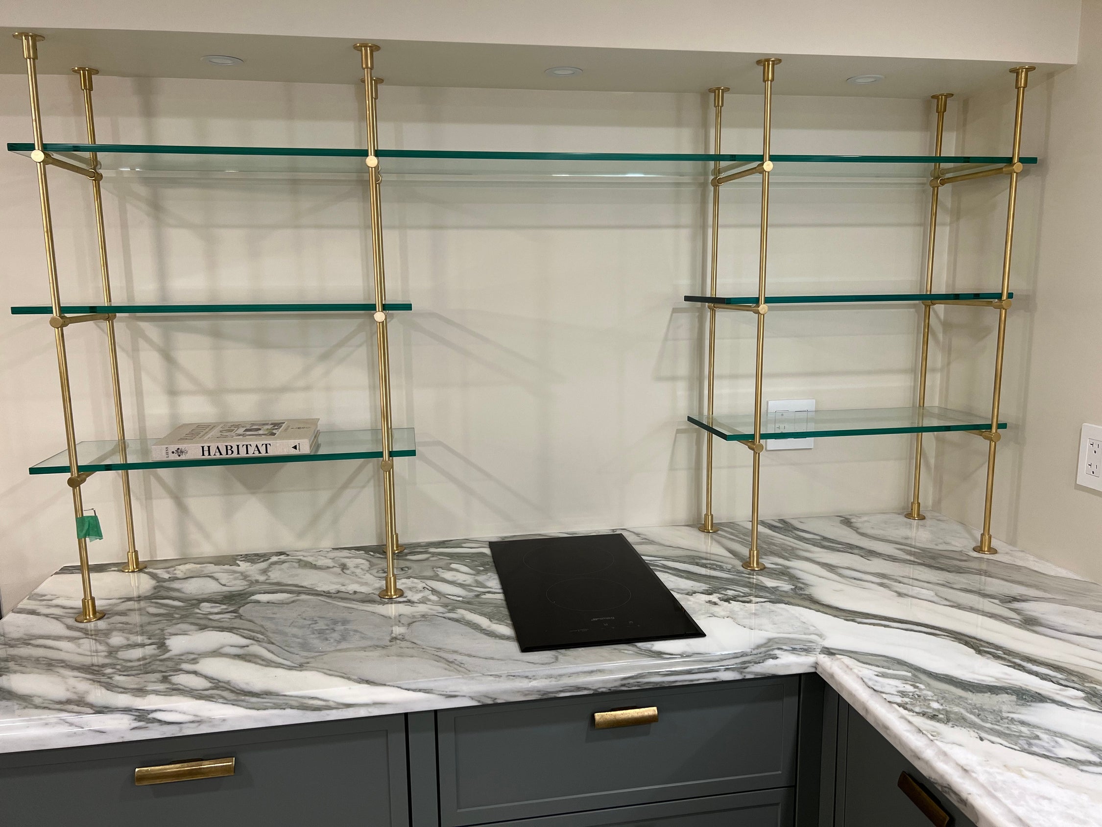 Ceiling and countertop mounted solid brass glass kitchen shelving, brushed brass, Atlanta, GA