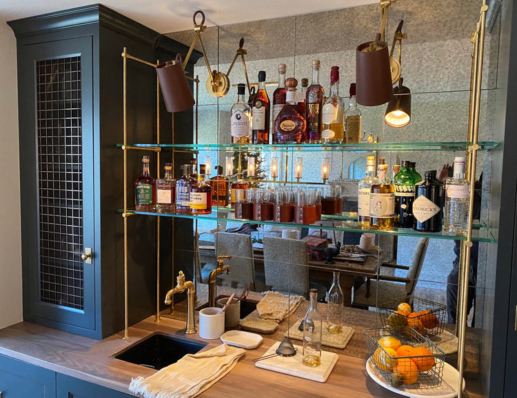 Wall and countertop mounted solid brass residential shelving with glass, brushed brass, Houston, TX