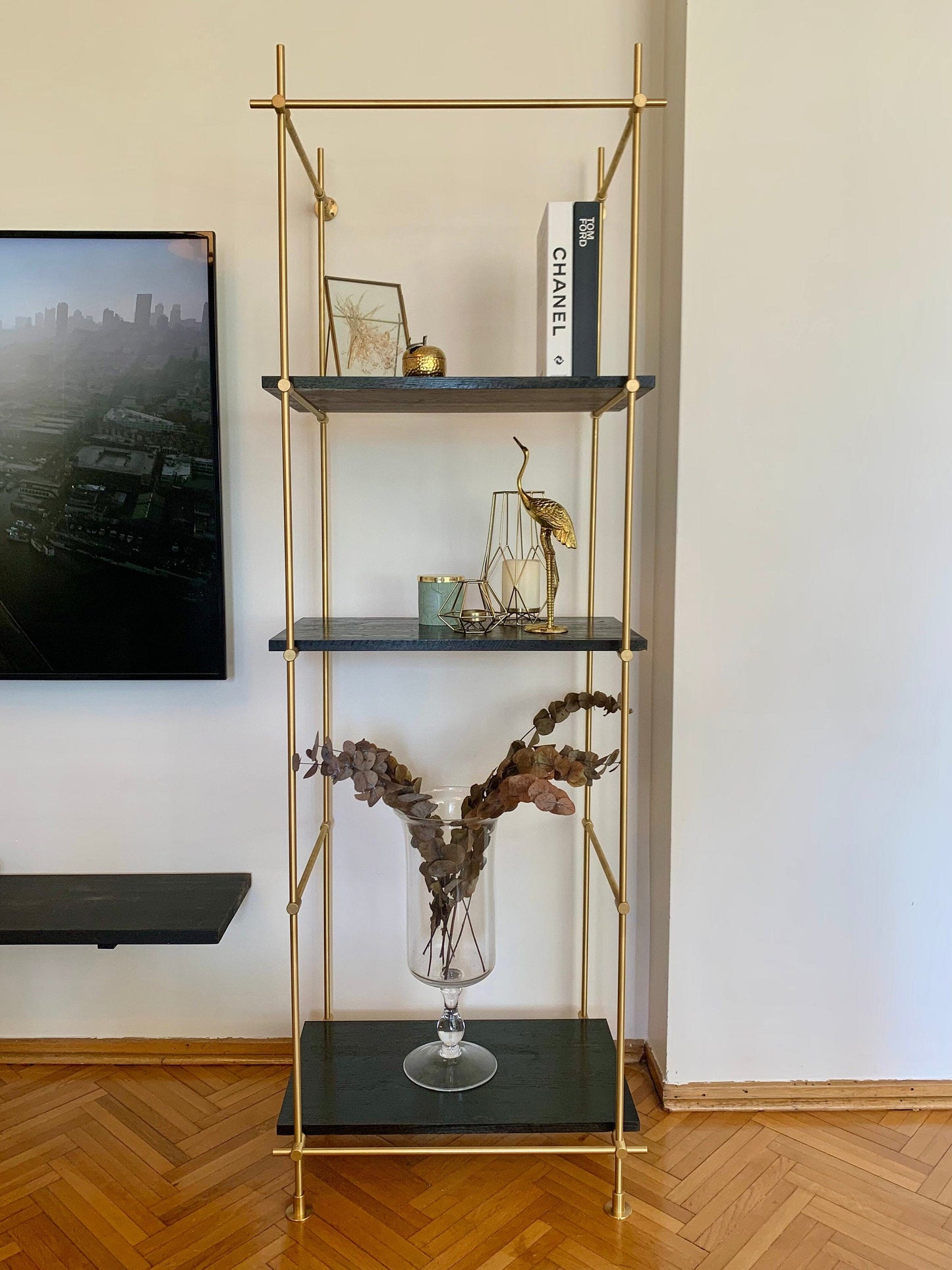 Gold bookcase and gold shelving unit. Harmony of unlacquered brass and dark oiled oak. Reflect luxury in your decoration. Shelving Brassshelf 