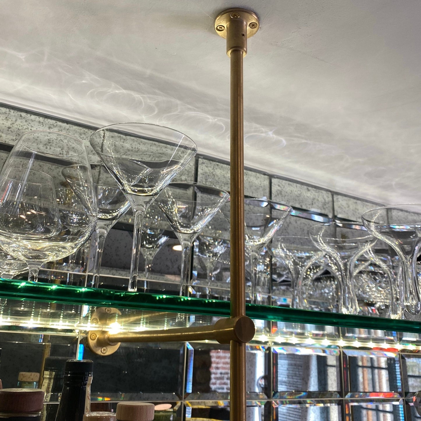 Customized bistro bar. (Up to 50'' height - 70'' width - 15'' depth) Wall & ceiling mounted, unlacquered satin and solid brass bistro bar.
